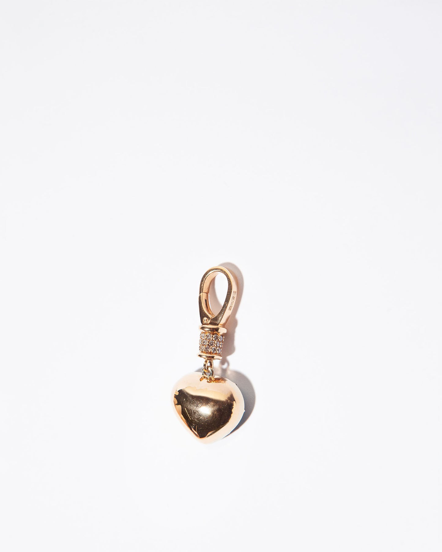 NOVI Jewelry 18K gold pendant with 11.15 ct heart-shaped blue zircon and natural brilliant-cut diamonds, IGI certified luxury gemstone jewelry.