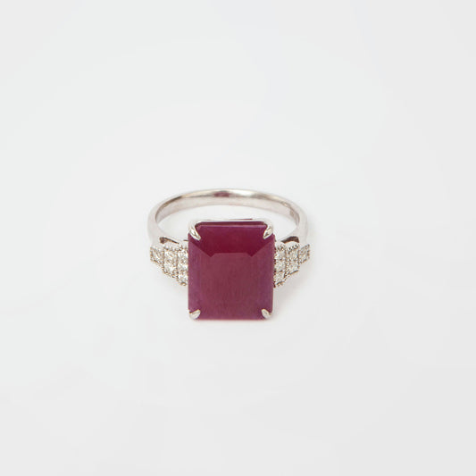14K White gold ring featuring 6.99 ct natural ruby and 12 diamonds totaling 0.14 ct, certified by IGI.