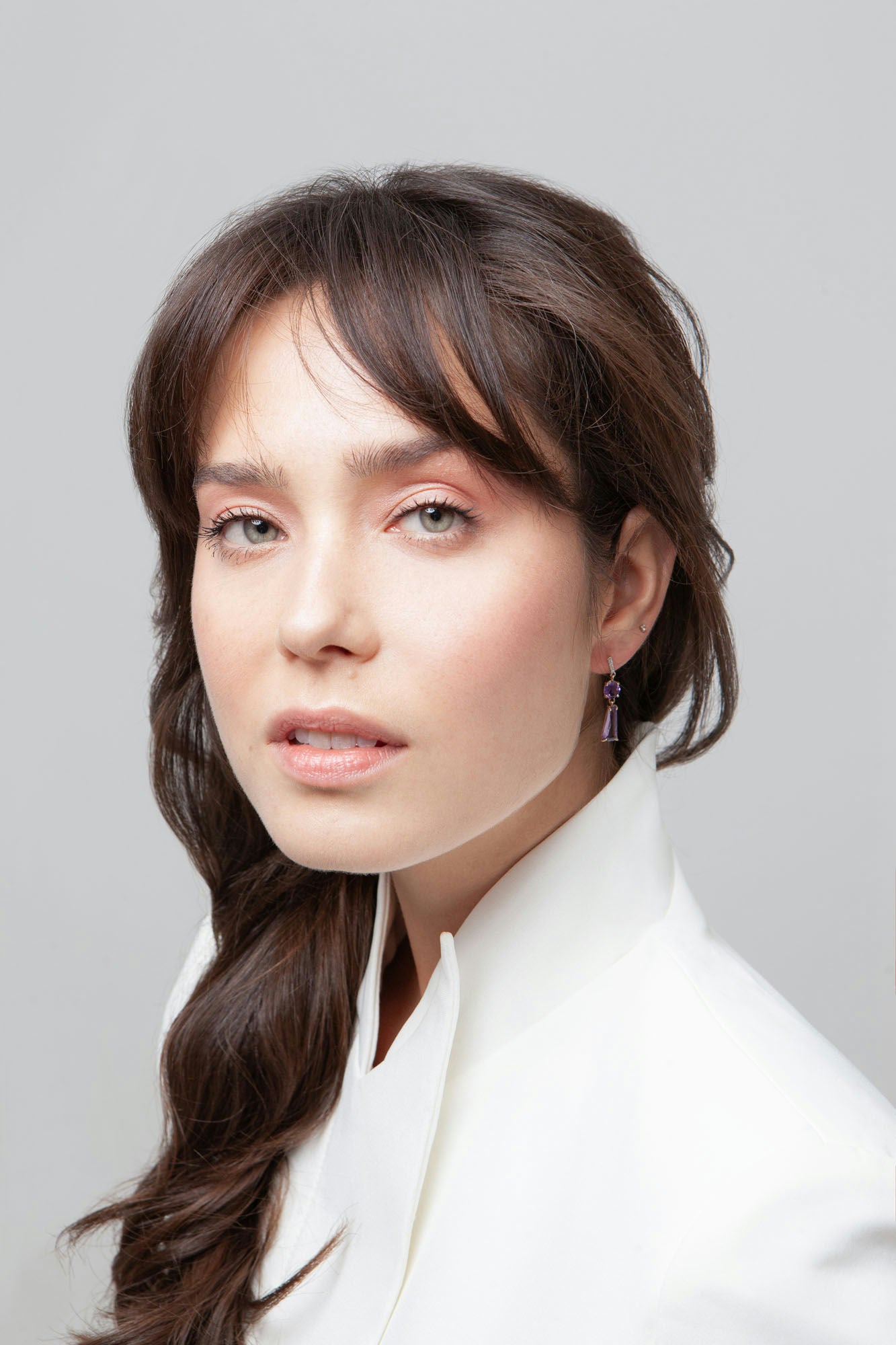 14K gold earrings featuring amethysts and diamond accents.