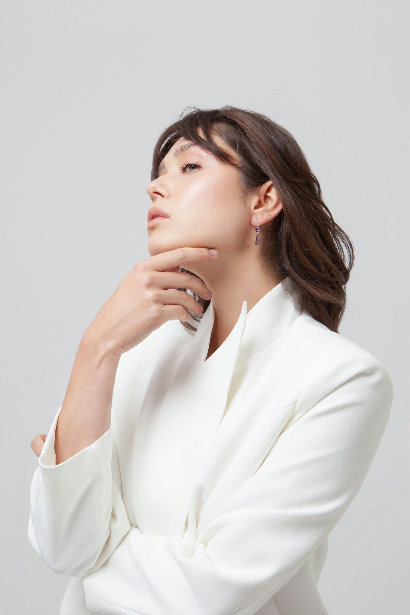 14K gold earrings featuring amethysts and diamond accents.