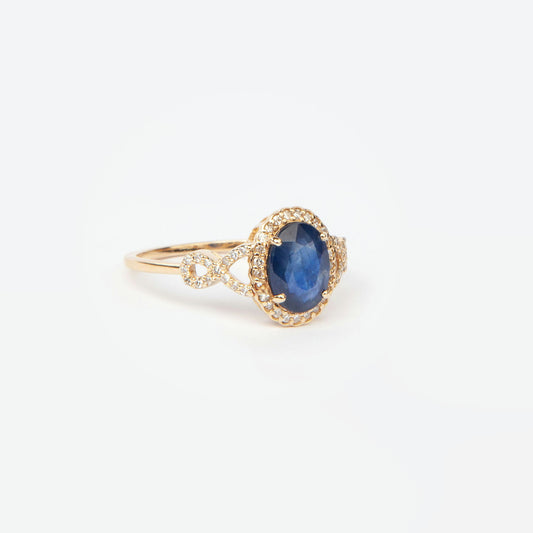 14K yellow gold ring featuring 1.64ct oval mixed-cut natural sapphire and 53 diamonds, total 1.79ct, HRD certified.