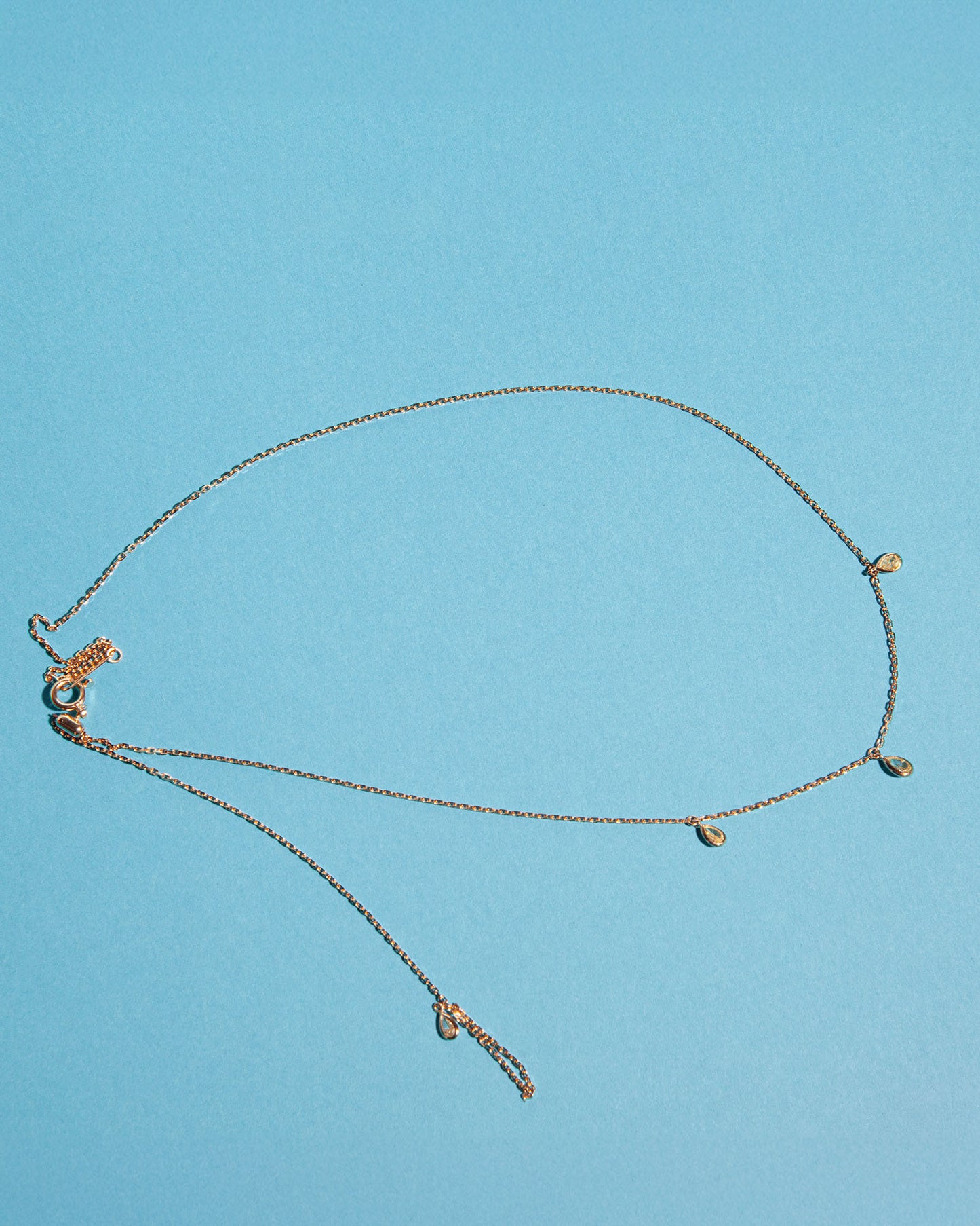 NOVI Jewelry 18K gold drop necklace with 0.29 ct pear-shaped fancy yellow natural diamonds, I1/SI2, IGI certified, delicate adjustable chain diamond necklace.