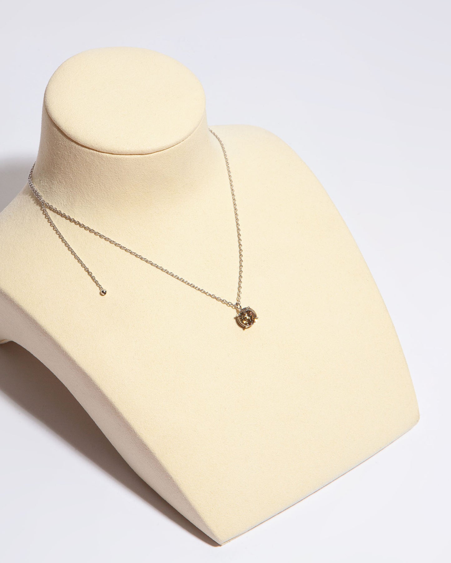 NOVI Jewelry 18K gold pendant necklace with 1.51 ct fancy yellow-brown natural diamond, I1, IGI certified luxury diamond jewelry.