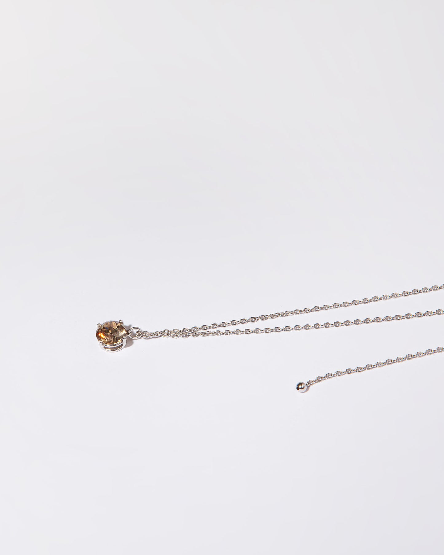 NOVI Jewelry 18K gold pendant necklace with 1.51 ct fancy yellow-brown natural diamond, I1, IGI certified luxury diamond jewelry.