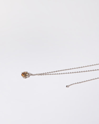 NOVI Jewelry 18K gold pendant necklace with 1.51 ct fancy yellow-brown natural diamond, I1, IGI certified luxury diamond jewelry.