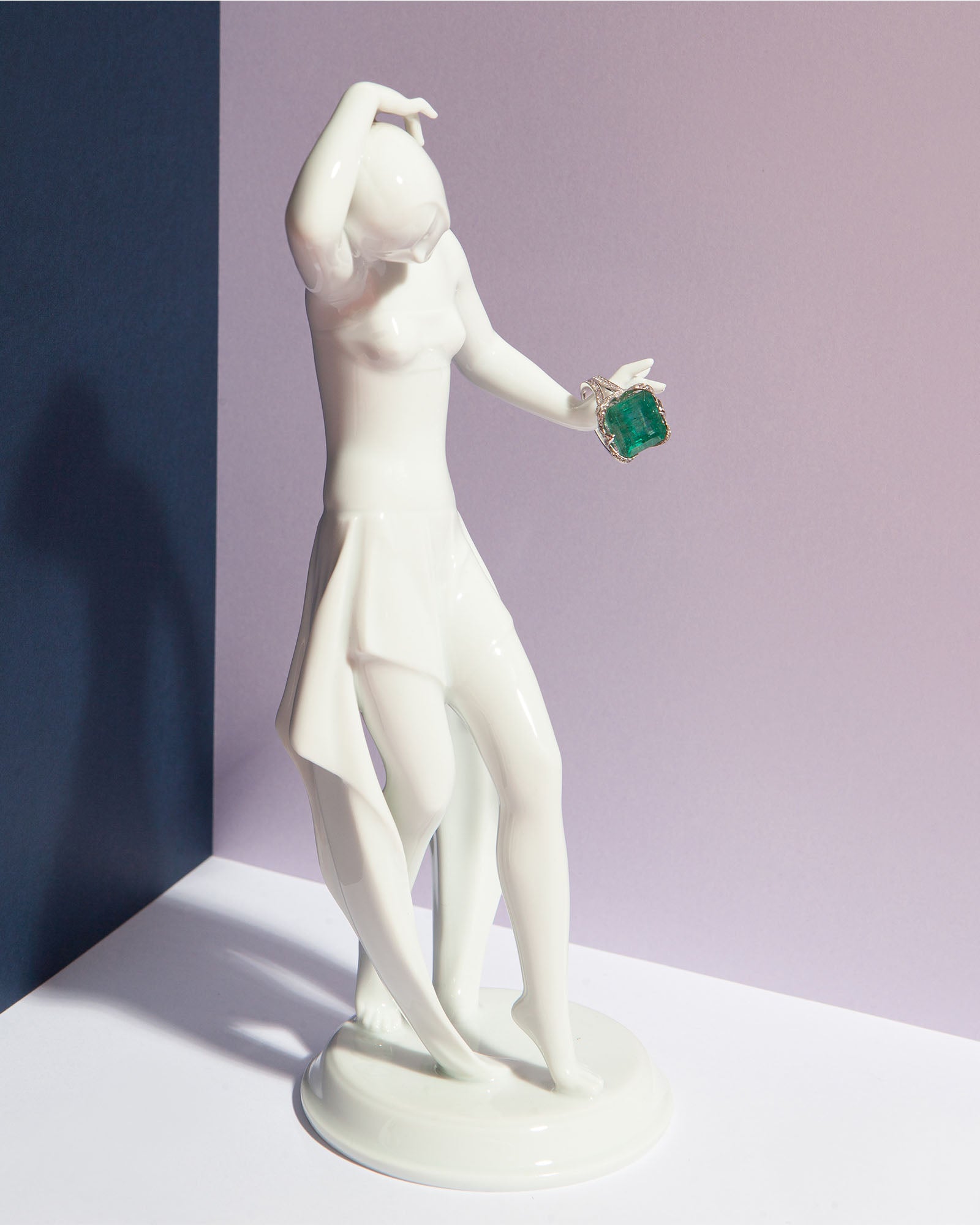 NOVI Jewelry 14K white gold ring featuring a 9.80 ct bluish-green emerald accented with 0.79 ct Faint Pink SI1/E diamonds, IGI certified, elegant and timeless design highlighting the emerald’s color and diamond sparkle.