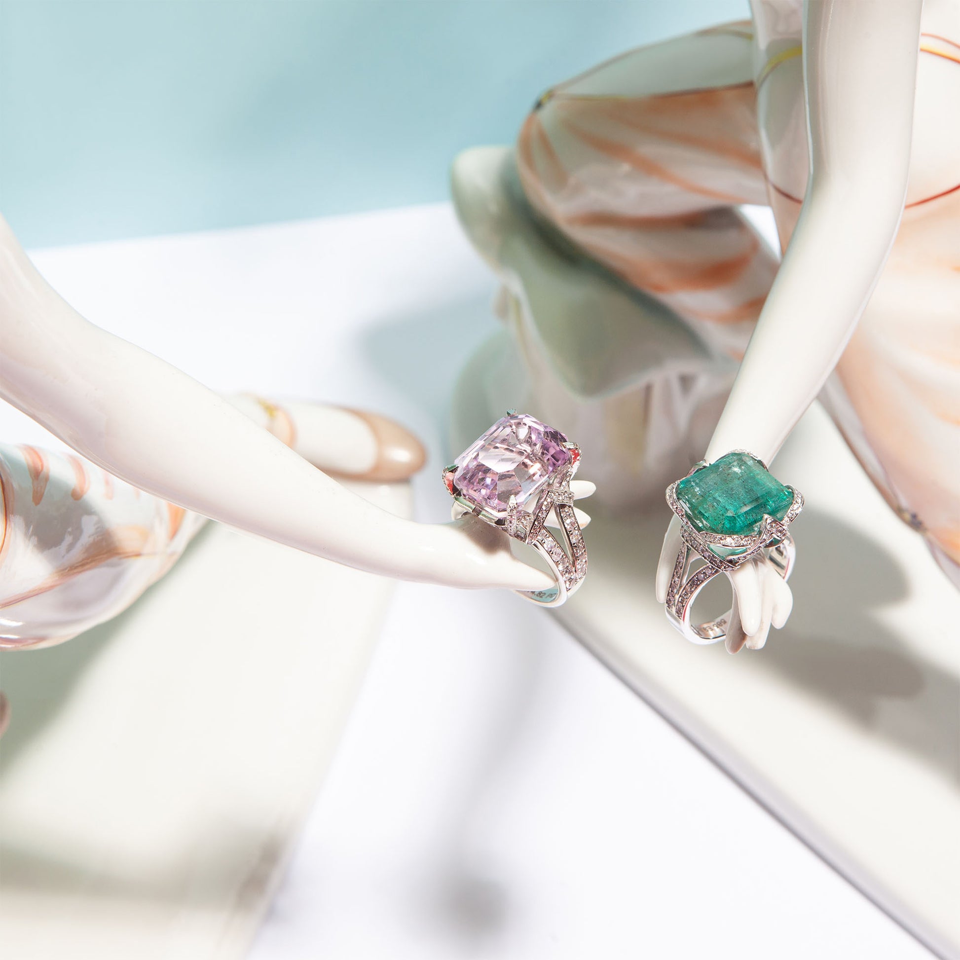 NOVI Jewelry 14K white gold ring featuring a 9.80 ct bluish-green emerald accented with 0.79 ct Faint Pink SI1/E diamonds, IGI certified, elegant and timeless design highlighting the emerald’s color and diamond sparkle.