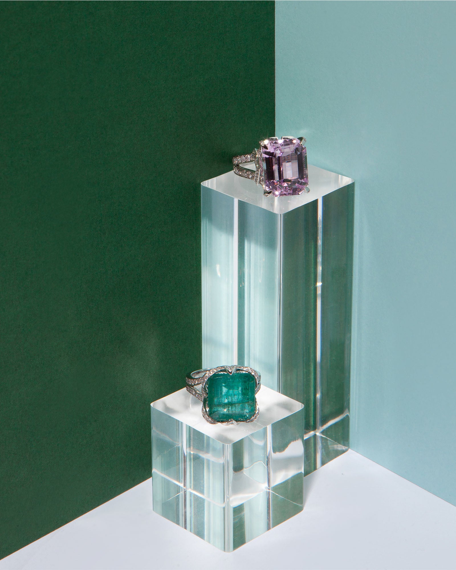 NOVI Jewelry 14K white gold ring featuring a 9.80 ct bluish-green emerald accented with 0.79 ct Faint Pink SI1/E diamonds, IGI certified, elegant and timeless design highlighting the emerald’s color and diamond sparkle.