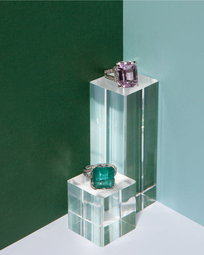 NOVI Jewelry 14K white gold ring featuring a 9.80 ct bluish-green emerald accented with 0.79 ct Faint Pink SI1/E diamonds, IGI certified, elegant and timeless design highlighting the emerald’s color and diamond sparkle.