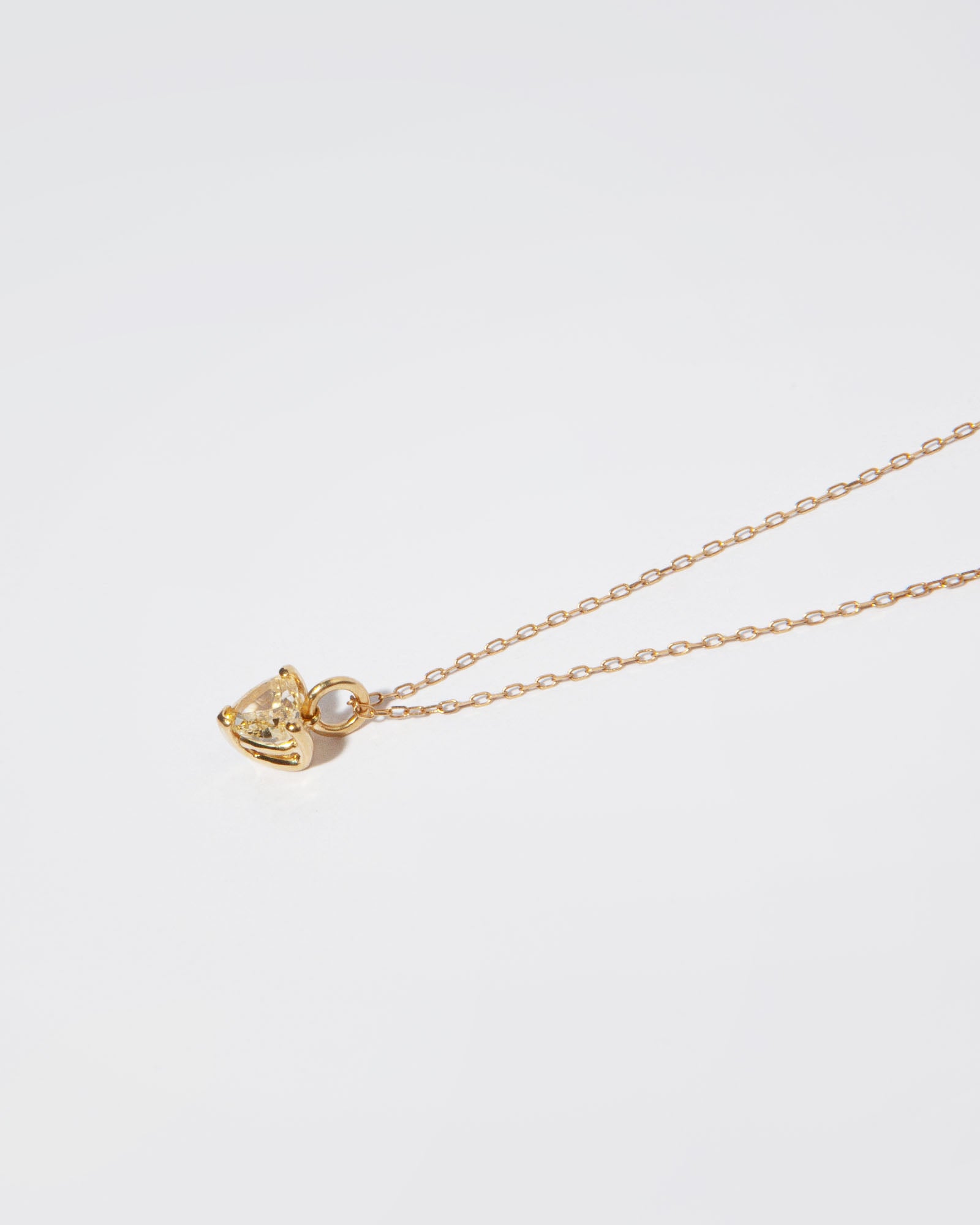 NOVI Jewelry 18K gold heart-shaped pendant with 0.42 ct fancy intense brownish-yellow natural diamond, IGI certified romantic diamond jewelry.