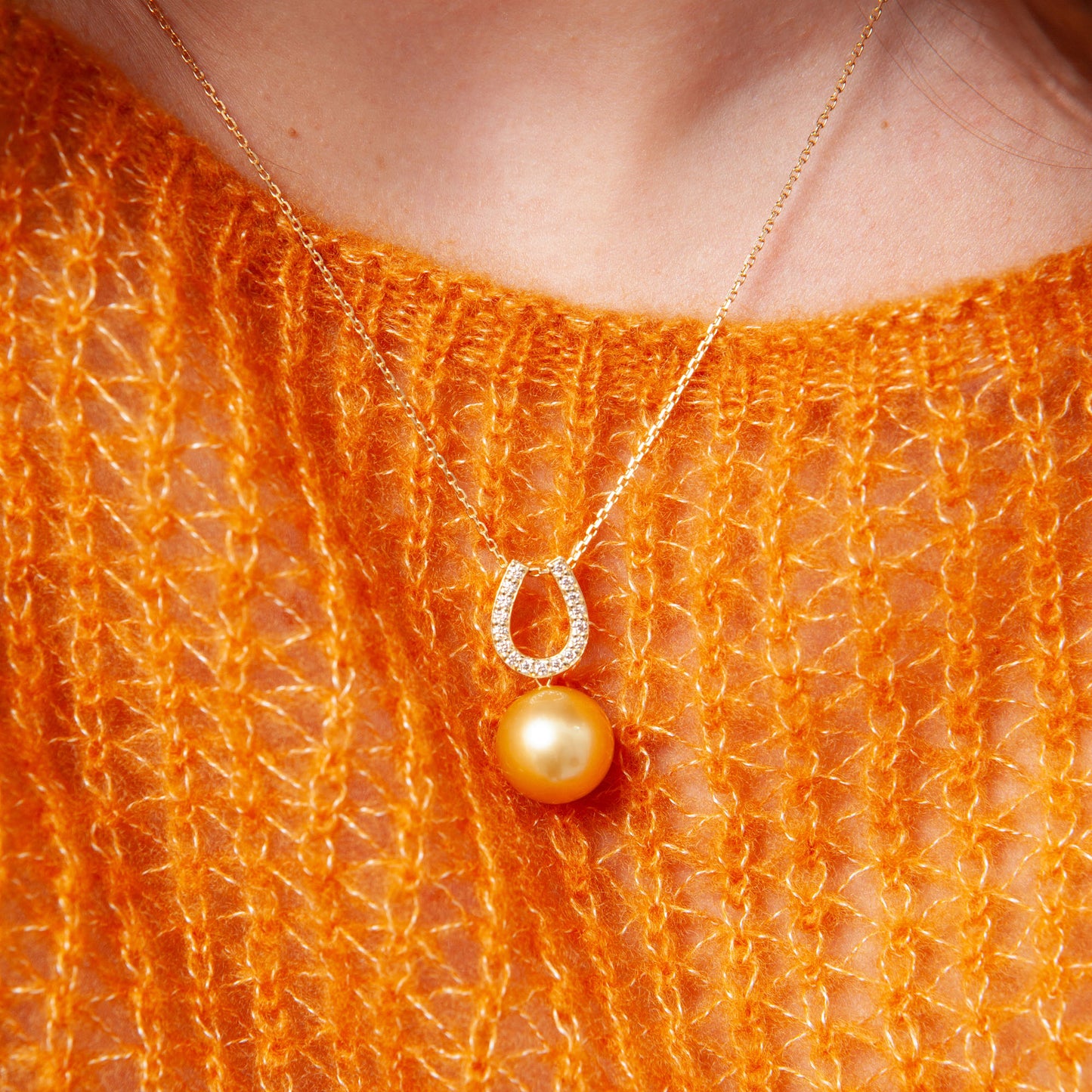 NOVI Jewelry 18K gold pendant with 12.6 mm golden South Sea pearl and 0.20 ct natural diamonds, luxury fine jewelry.