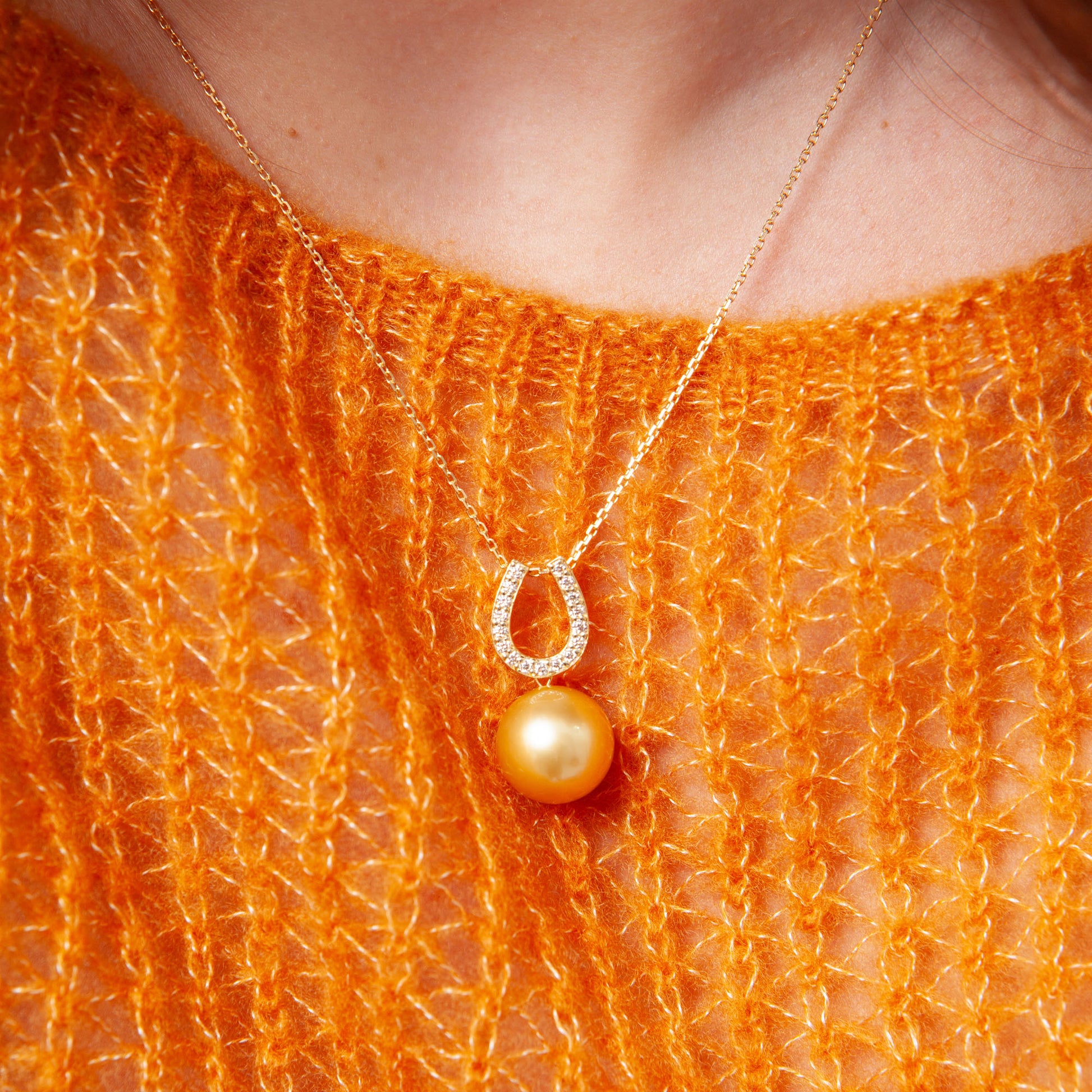NOVI Jewelry 18K gold pendant with 12.6 mm golden South Sea pearl and 0.20 ct natural diamonds, luxury fine jewelry.