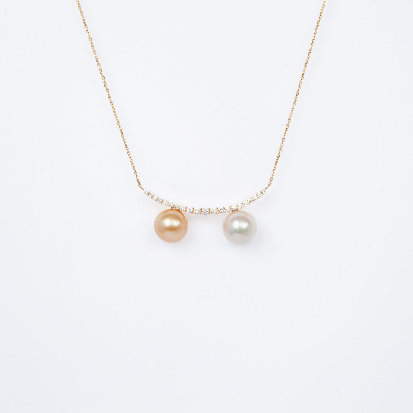 NOVI Jewelry 18K gold necklace with two 9 mm pearls and 0.30 ct natural diamonds, elegant dual-pearl luxury pendant.