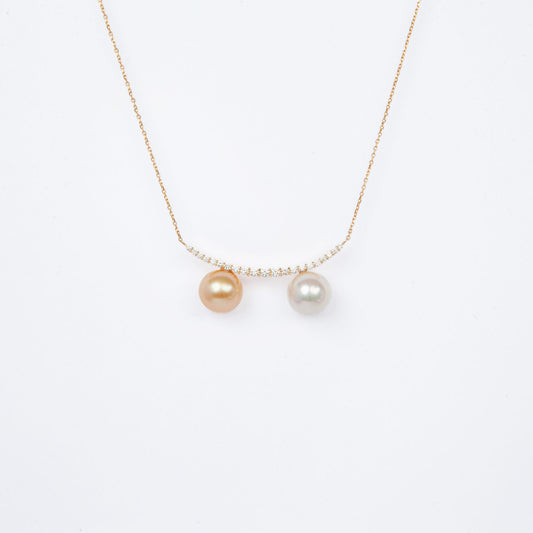 NOVI Jewelry 18K gold necklace with two 9 mm pearls and 0.30 ct natural diamonds, elegant dual-pearl luxury pendant.