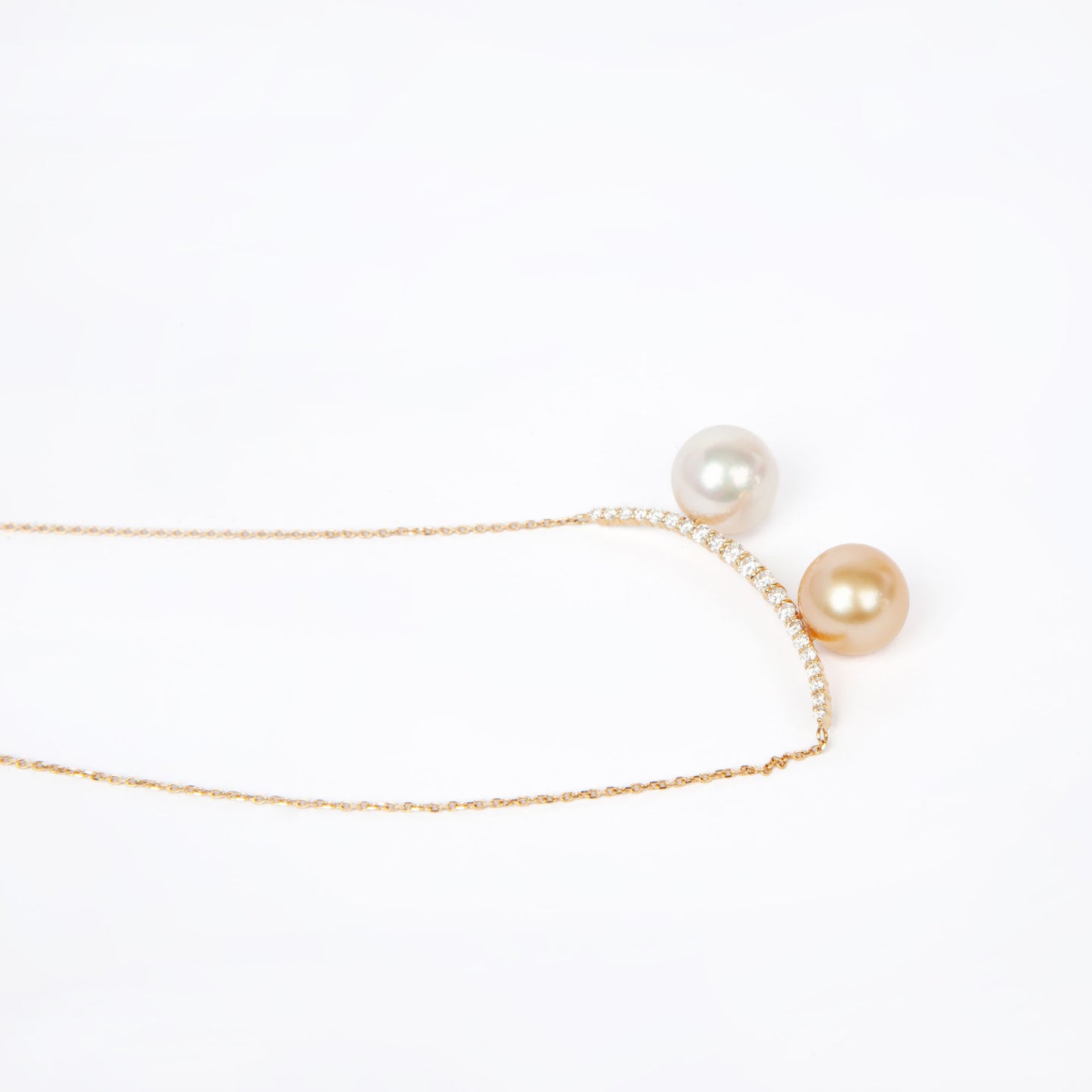 NOVI Jewelry 18K gold necklace with two 9 mm pearls and 0.30 ct natural diamonds, elegant dual-pearl luxury pendant.