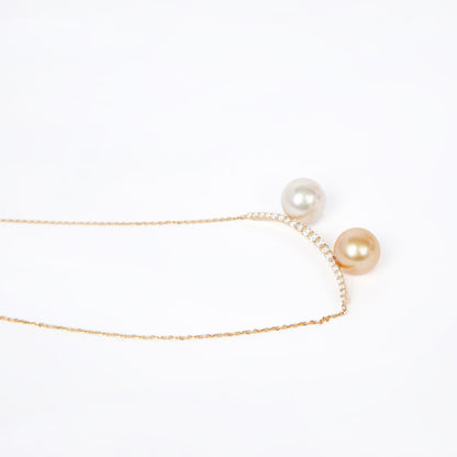 NOVI Jewelry 18K gold necklace with two 9 mm pearls and 0.30 ct natural diamonds, elegant dual-pearl luxury pendant.