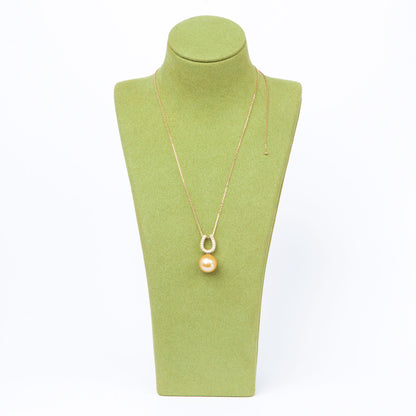 NOVI Jewelry 18K gold pendant with 12.6 mm golden South Sea pearl and 0.20 ct natural diamonds, luxury fine jewelry.