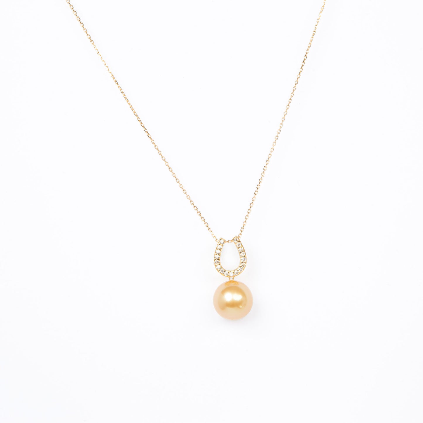 NOVI Jewelry 18K gold pendant with 12.6 mm golden South Sea pearl and 0.20 ct natural diamonds, luxury fine jewelry.