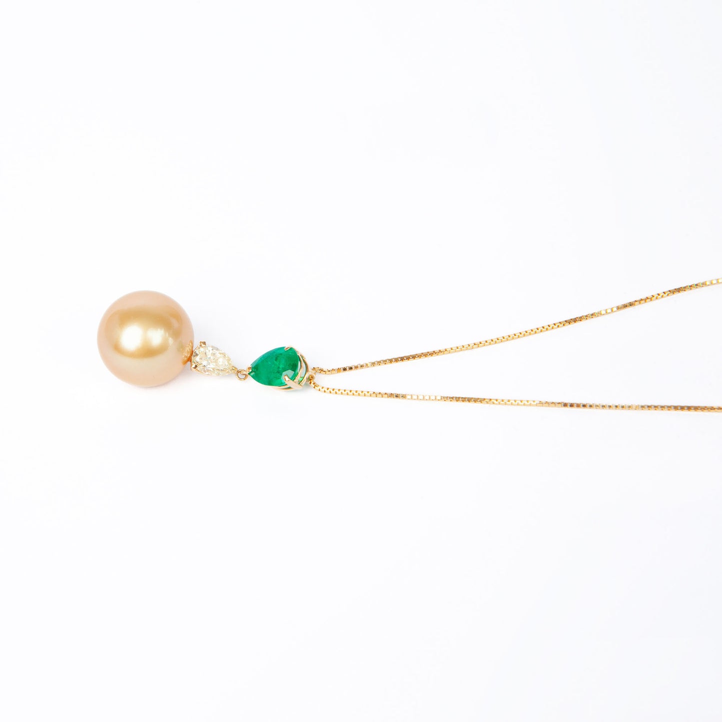 NOVI Jewelry 18K gold necklace with 12.5 mm Golden Pearl, 0.80 ct emerald and 0.383 ct natural diamond, CGL certified luxury gemstone pendant.