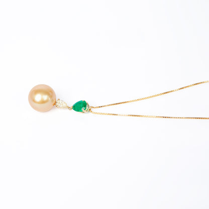 NOVI Jewelry 18K gold necklace with 12.5 mm Golden Pearl, 0.80 ct emerald and 0.383 ct natural diamond, CGL certified luxury gemstone pendant.