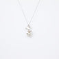NOVI Jewelry 18K white gold necklace with 7 mm South Sea pearl and 0.06 ct natural diamonds, elegant pearl pendant.