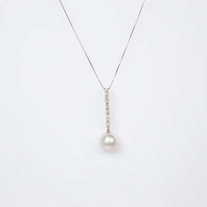 NOVI Jewelry floral-inspired pendant with blue-toned gemstones, elegant luxury gemstone flower design.