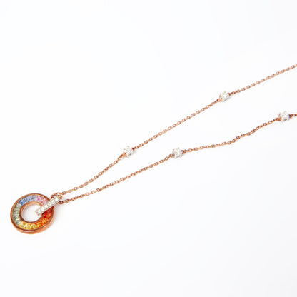 NOVI Jewelry 18K rose and white gold necklace with 1.45 ct multicolour sapphires and 0.31 ct natural diamonds, elegant circular sapphire pendant.