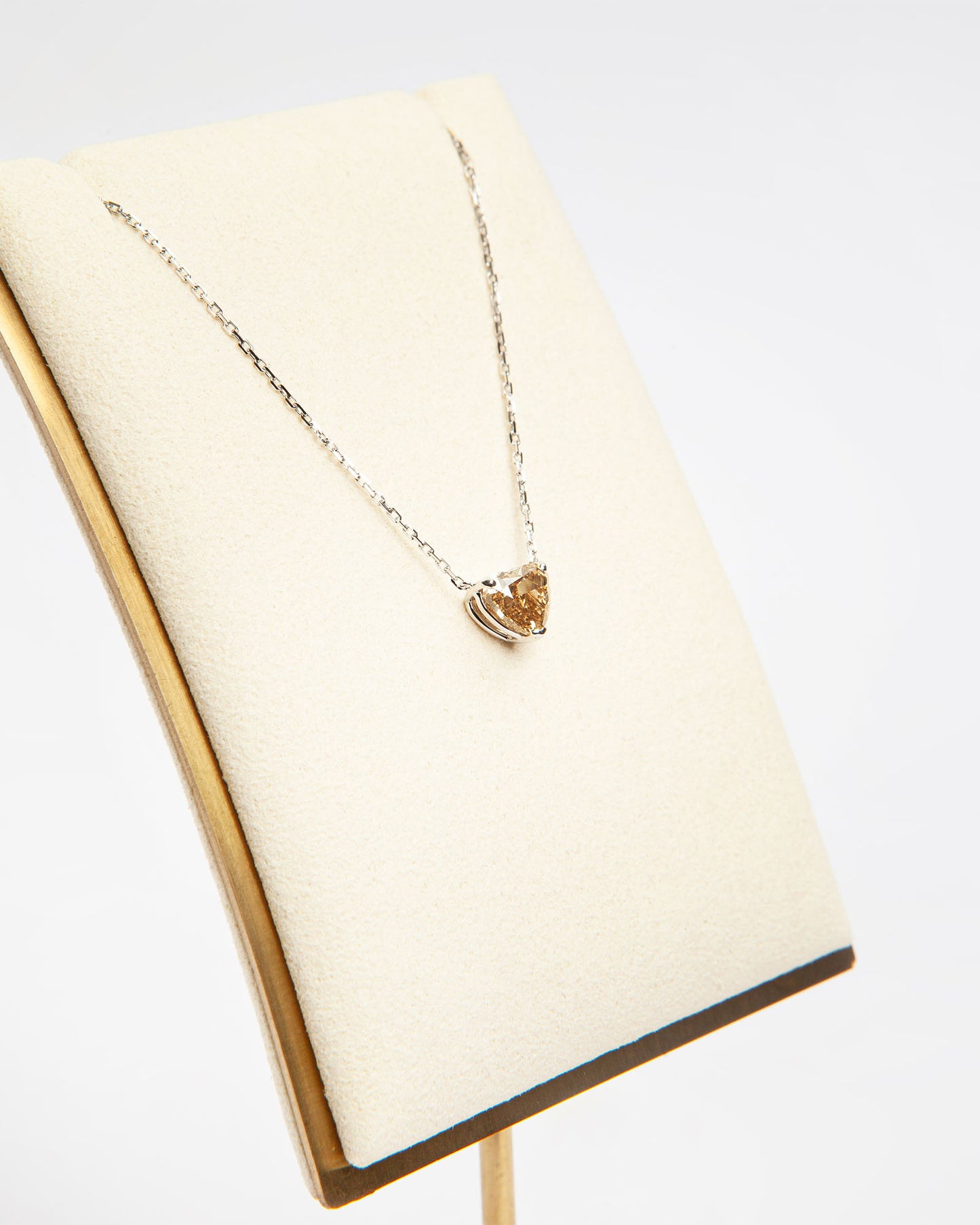 NOVI Jewelry 18K gold heart-shaped pendant with 1.13 ct fancy intense brownish-yellow natural diamond, VS2, GRA certified luxury diamond necklace.