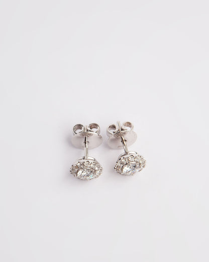 NOVI Jewelry halo stud earrings with 0.60 ct D/E color natural diamonds, IF/VVS2, IGI certified, jewelry weight 3.4 g, gold weight 3.3 g, round brilliant cut diamond earrings.