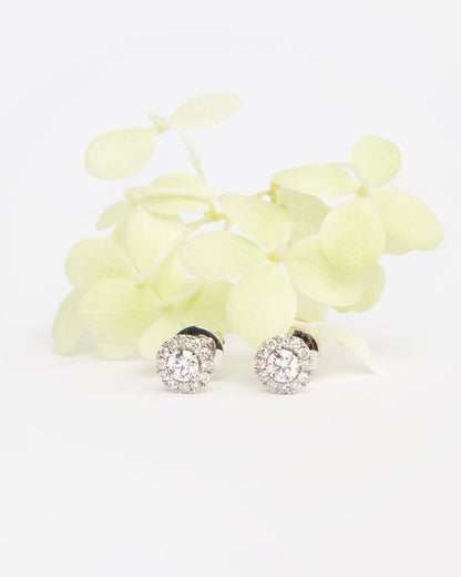 NOVI Jewelry halo stud earrings with 0.60 ct D/E color natural diamonds, IF/VVS2, IGI certified, jewelry weight 3.4 g, gold weight 3.3 g, round brilliant cut diamond earrings.