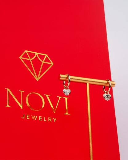 NOVI Jewelry 18K rose gold earrings with 1.01 ct heart-cut natural diamonds, GIA certified luxury diamond earrings.