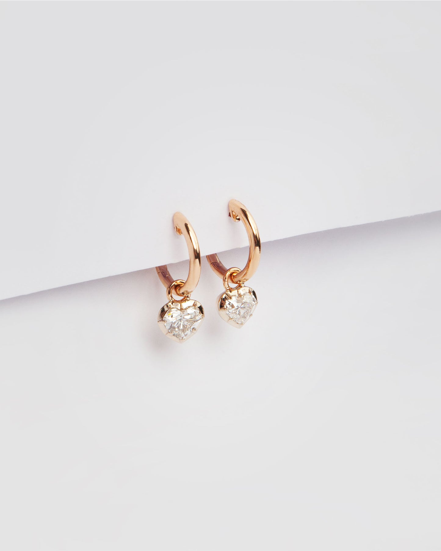 NOVI Jewelry 18K rose gold earrings with 1.01 ct heart-cut natural diamonds, GIA certified luxury diamond earrings.