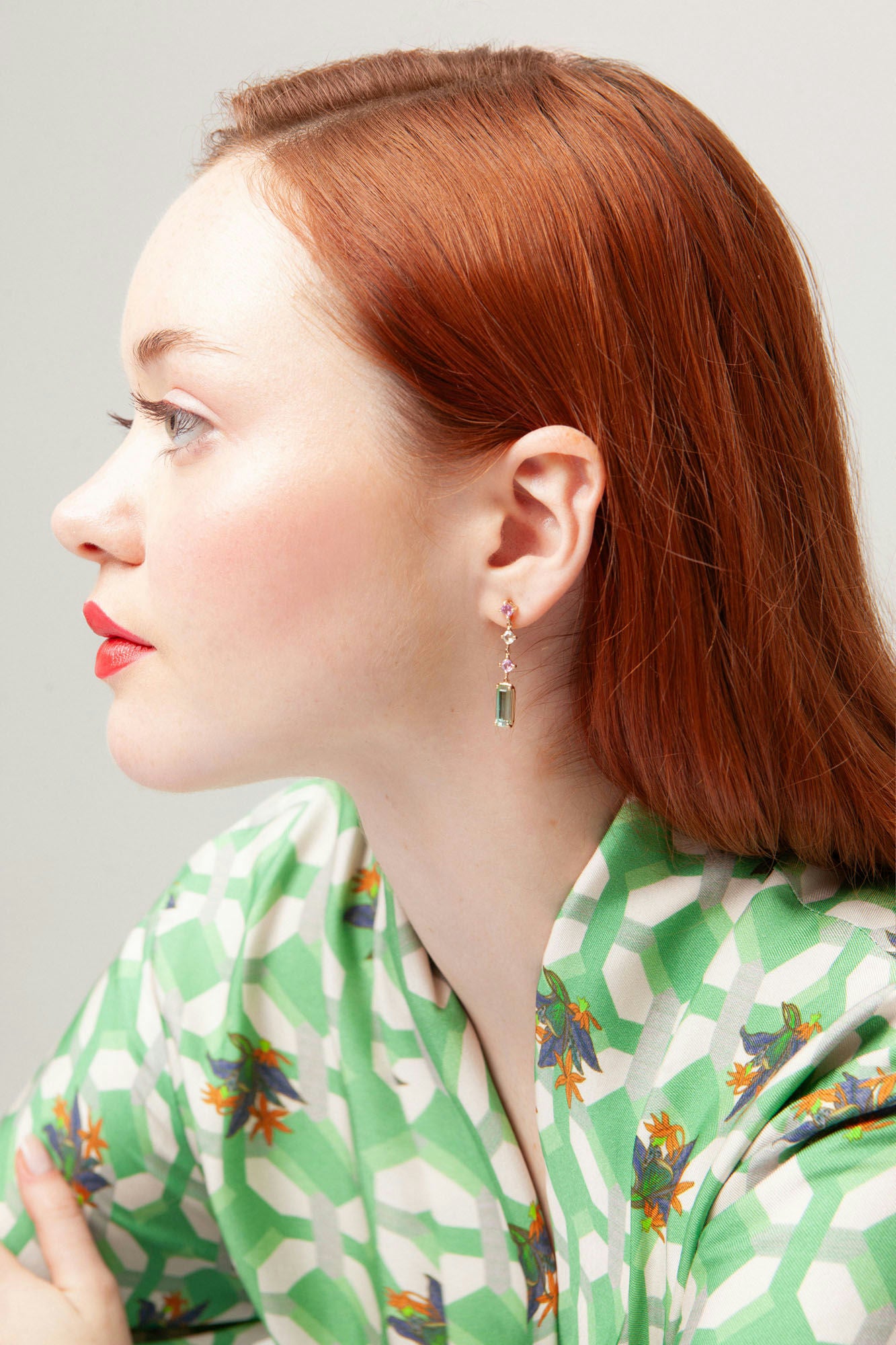 Earrings in 18K yellow gold featuring bi-color watermelon tourmaline 3.905 ct and pink sapphire 1.095 ct.