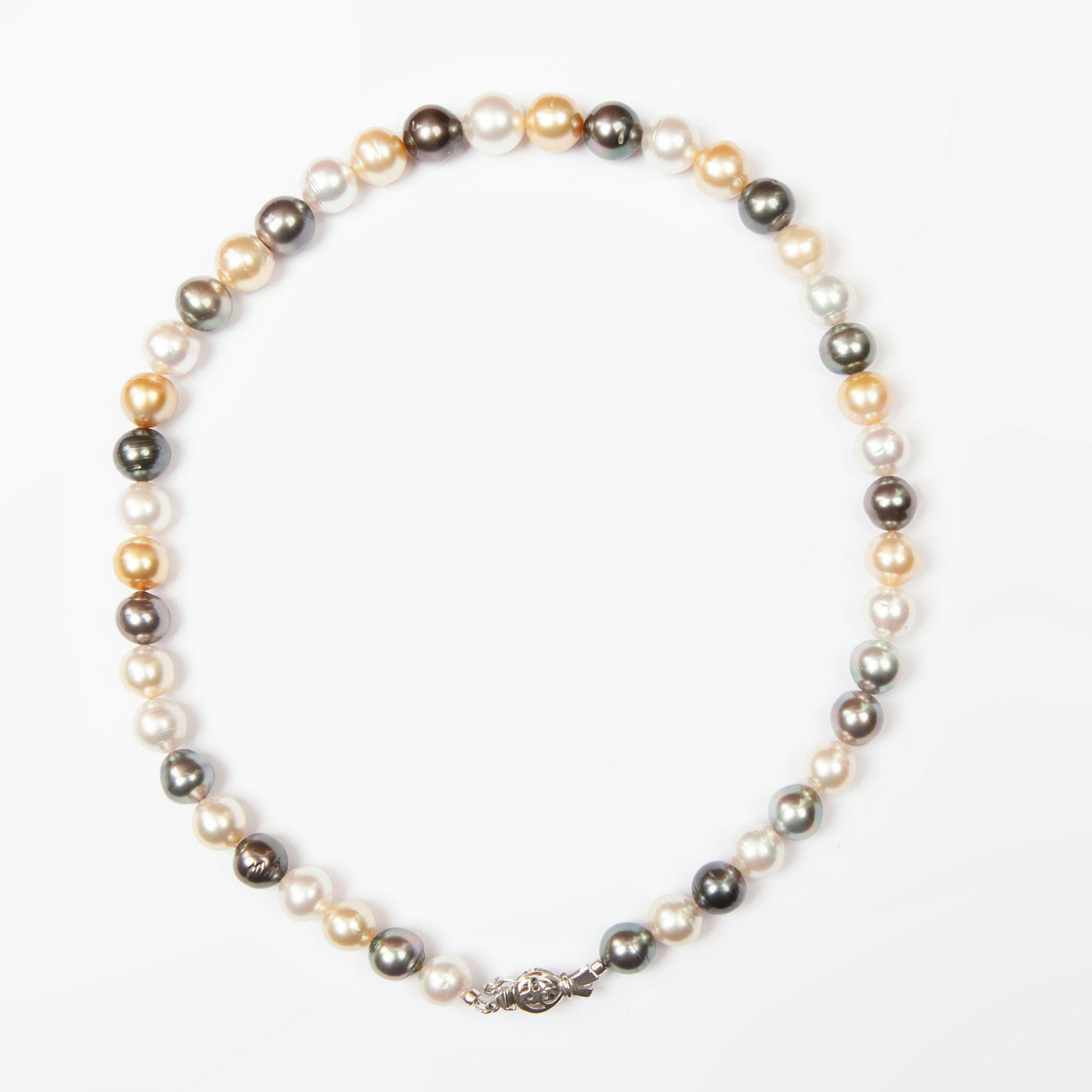 Elegant necklace featuring 43 natural South Sea pearls in white, golden, and dark tones.