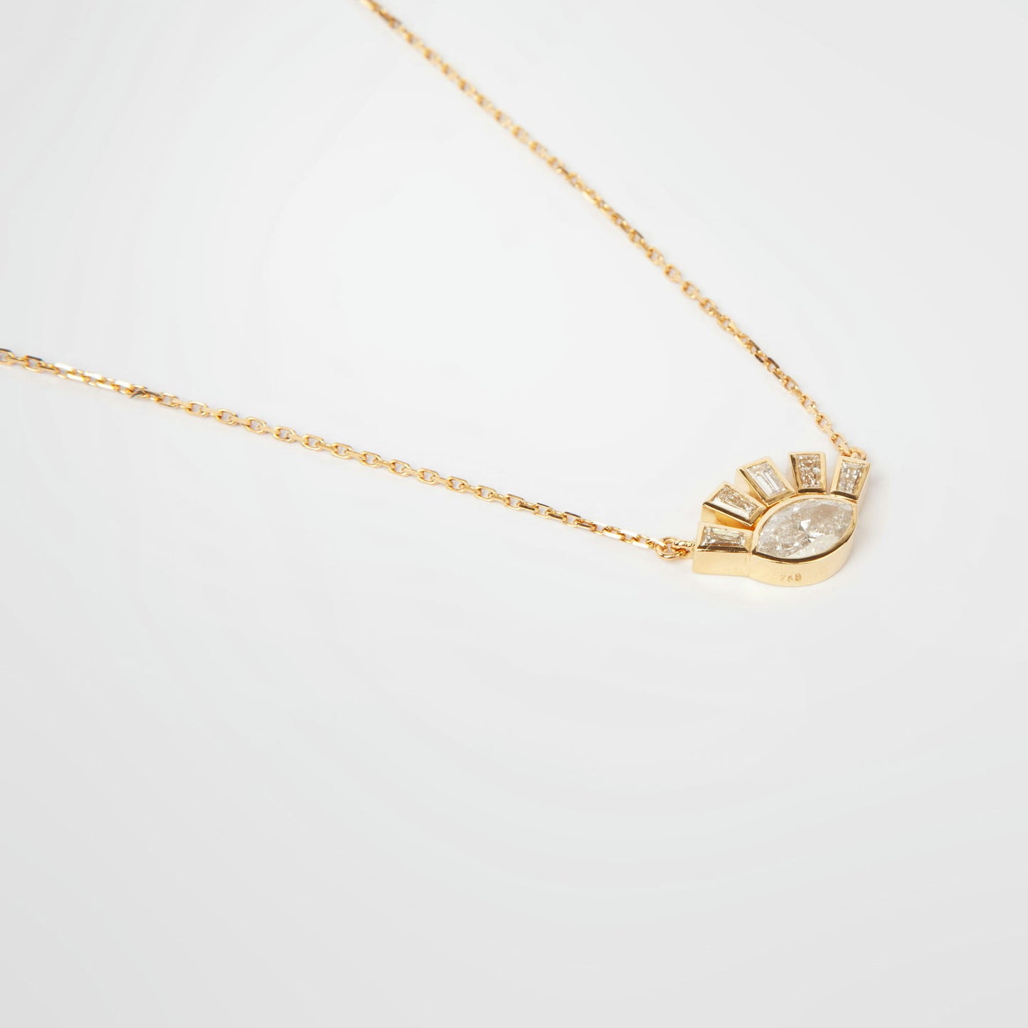 18K white gold necklace featuring 1.01 ct marquise diamond and 0.62 ct trapezoid-cut diamonds, IGI and IGE certified.
