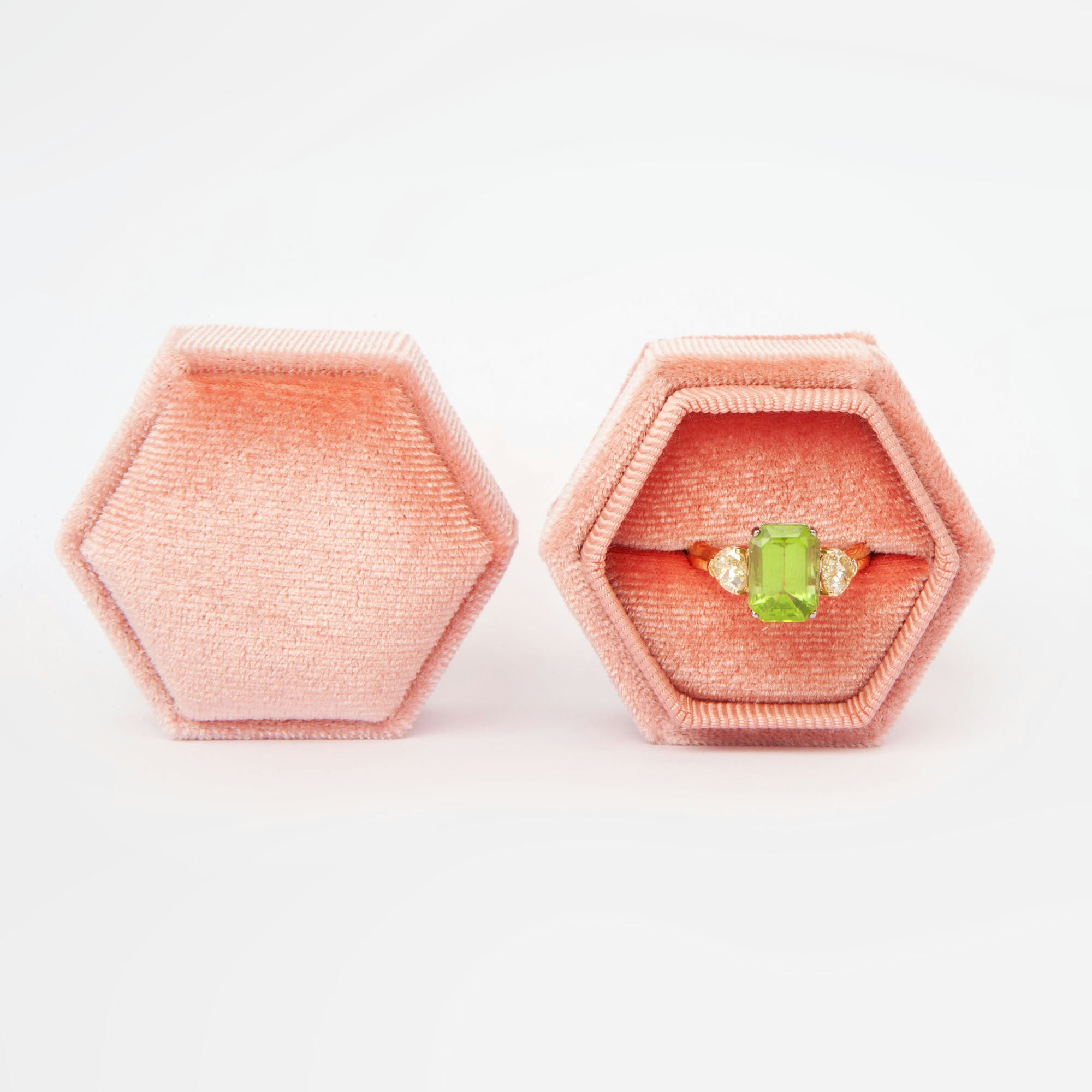 18k gold ring featuring a vivid natural peridot (3.72 ct) accented by two diamonds.