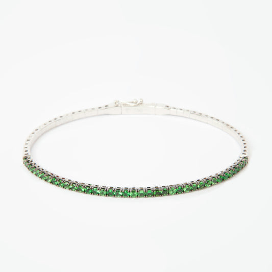 Tennis bracelet in 18K white gold featuring 37 natural tsavorites, total gemstone weight approx. 1.10 carats.