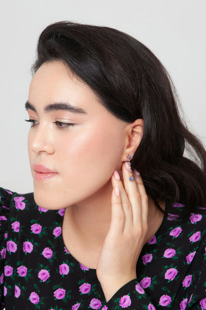 Drop earrings in 18K rose gold featuring 2.833 ct total weight of blue and pink sapphires, and round-cut diamonds.