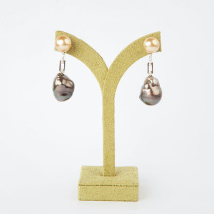 Earrings in 18K white gold featuring 10 mm South Sea pearls, 15 mm black baroque pearls, and 10 diamonds totaling 0.21 ct.