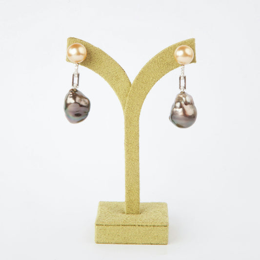 Earrings in 18K white gold featuring 10 mm South Sea pearls, 15 mm black baroque pearls, and 10 diamonds totaling 0.21 ct.
