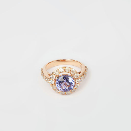 18K rose gold ring featuring 2.55 ct natural tanzanite and 24 natural diamonds totaling 1.211 ct.