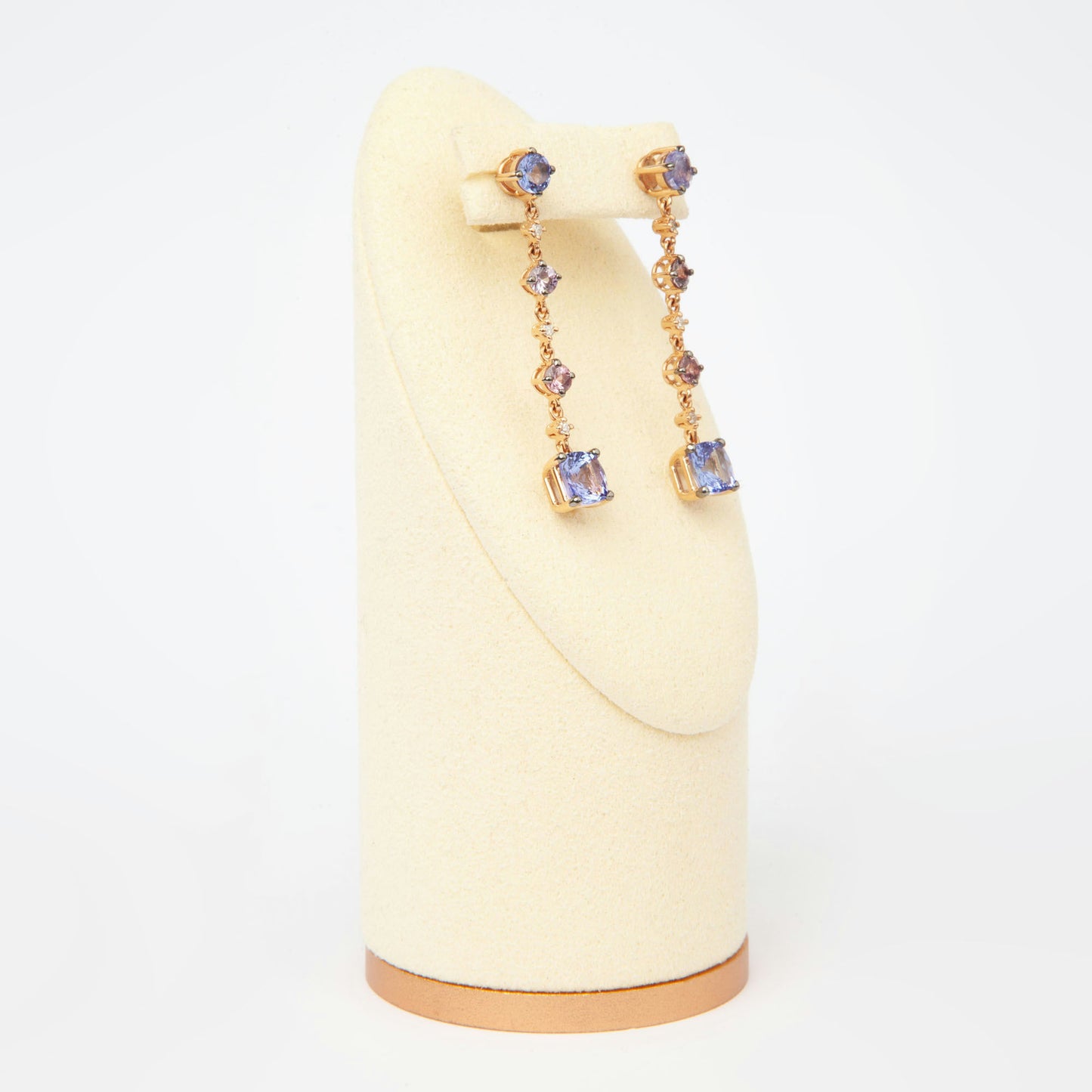 Drop earrings in 18K rose gold featuring 2.833 ct total weight of blue and pink sapphires, and round-cut diamonds.