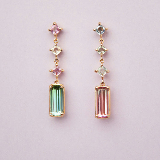 Earrings in 18K yellow gold featuring bi-color watermelon tourmaline 3.905 ct and pink sapphire 1.095 ct.