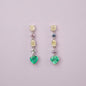 Drop earrings in 18K white gold featuring 1.669 ct heart-cut emeralds and 1.674 ct total diamonds and color sapphires.