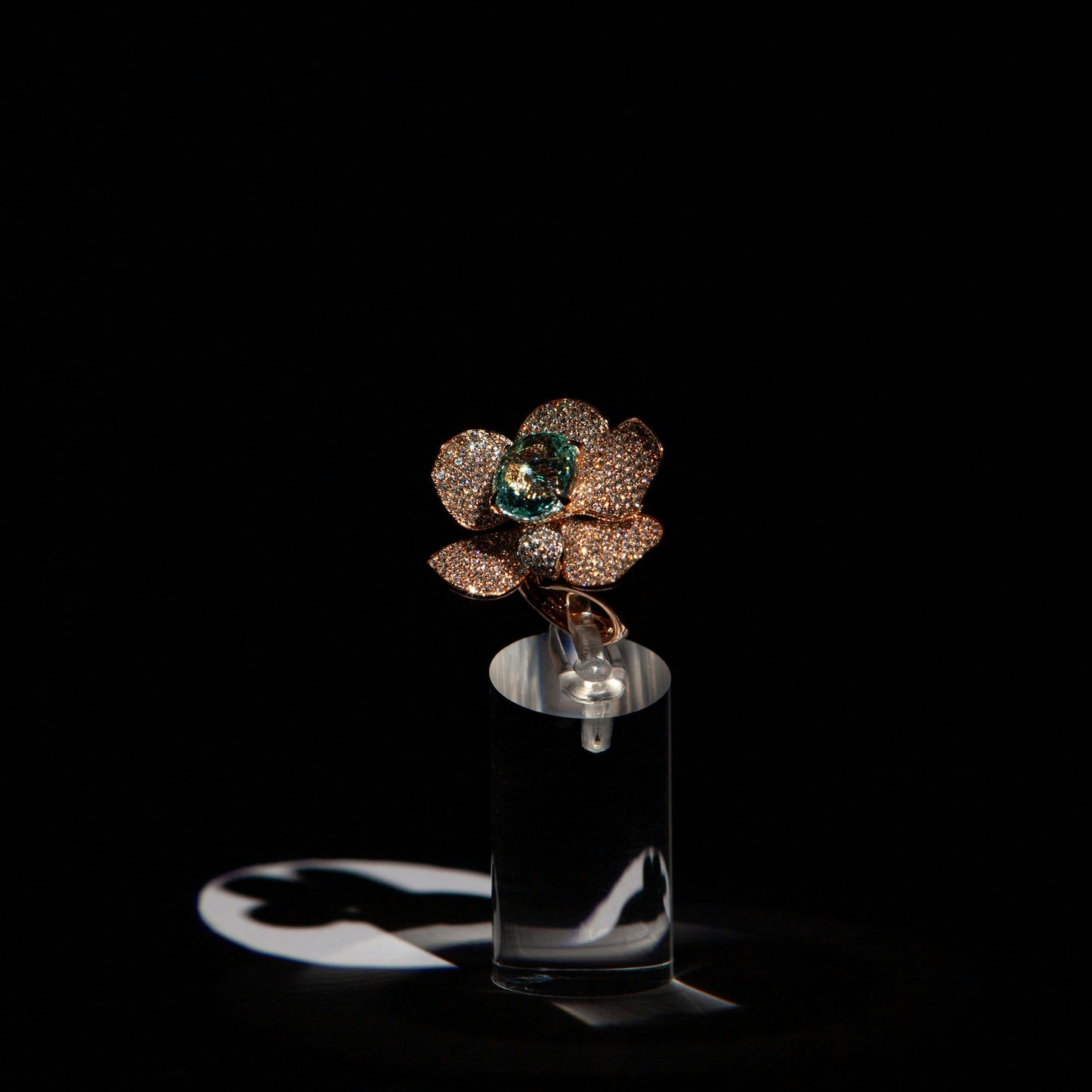 Statement ring in 18K rose gold featuring 9.2 ct GIA-certified green Paraiba tourmaline and 4.00 ct natural diamonds.