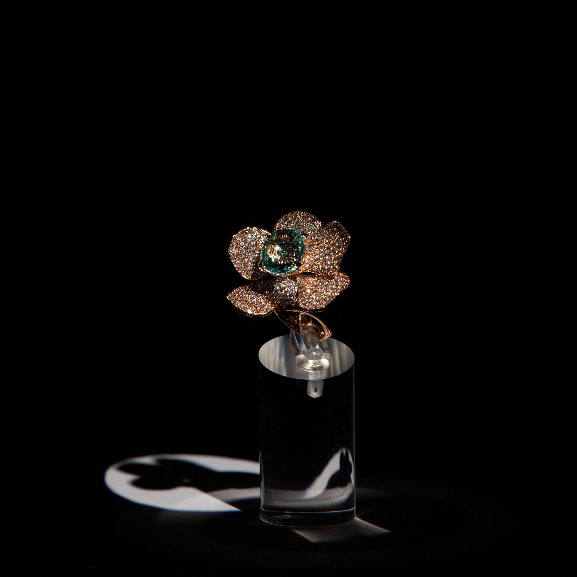 Statement ring in 18K rose gold featuring 9.2 ct GIA-certified green Paraiba tourmaline and 4.00 ct natural diamonds.
