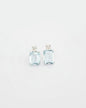 Earrings in 18K gold featuring 4.00 ct emerald-cut aquamarines and 0.50 ct diamonds.