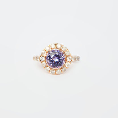 18K rose gold ring featuring 2.55 ct natural tanzanite and 24 natural diamonds totaling 1.211 ct.