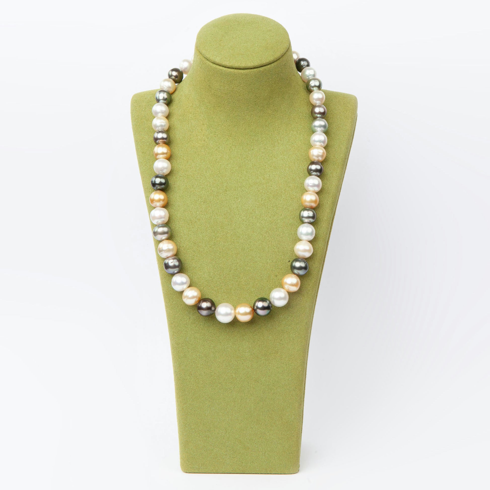 Elegant necklace featuring 43 natural South Sea pearls in white, golden, and dark tones.