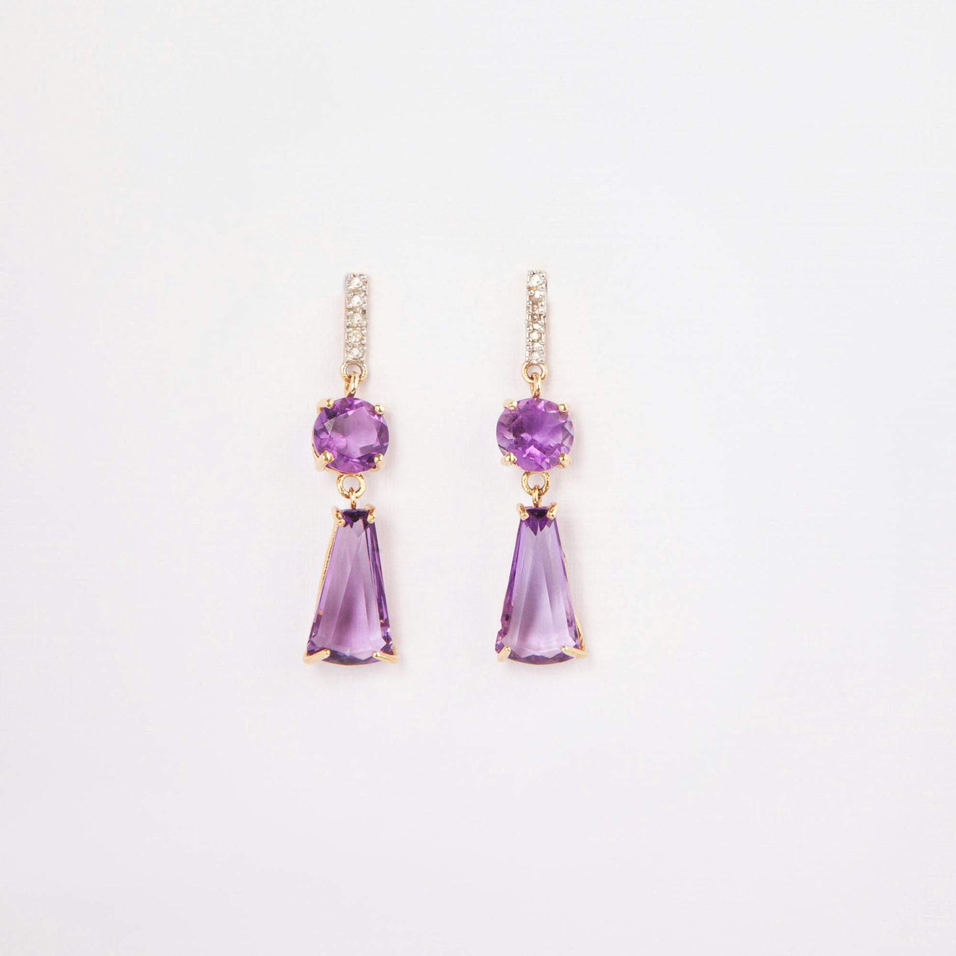 14K gold earrings featuring amethysts and diamond accents.